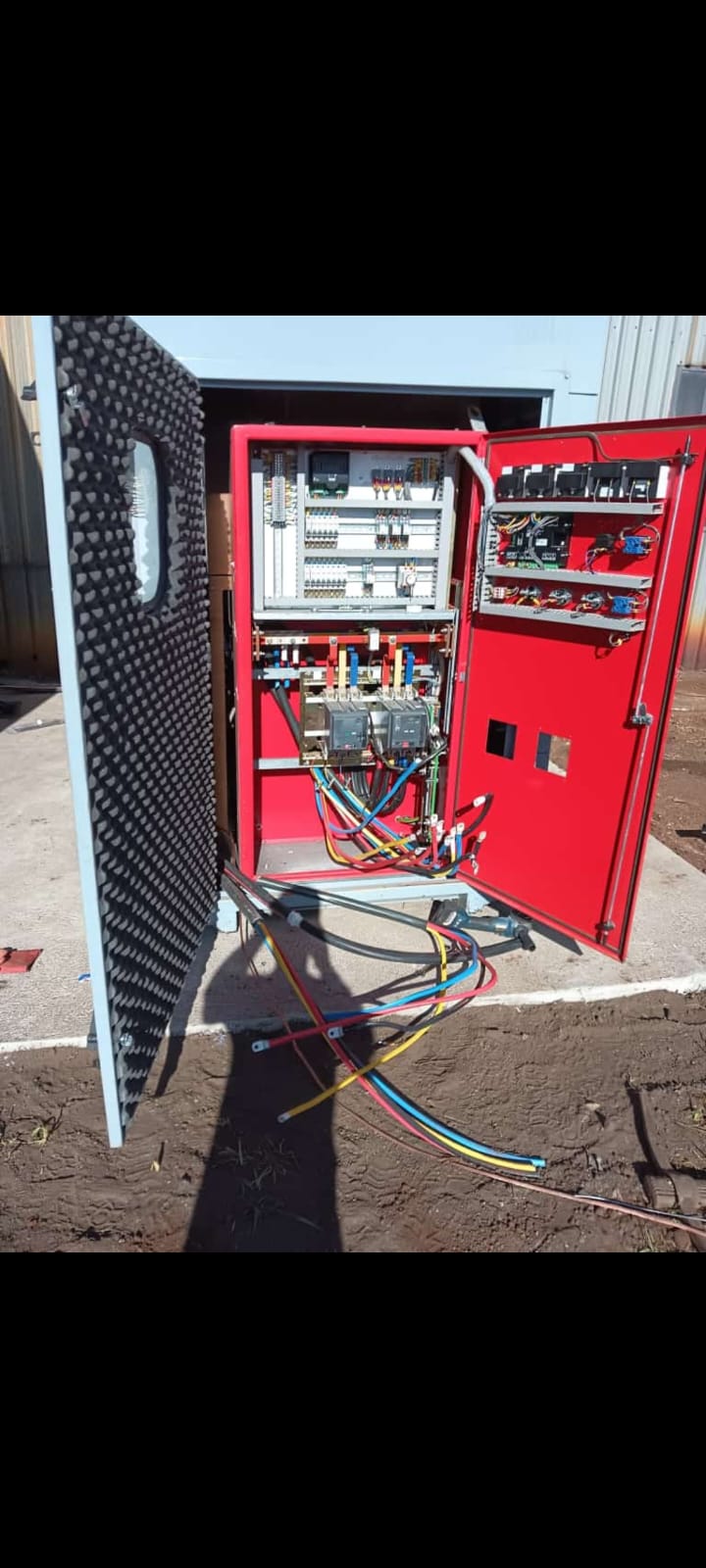 DuoAir technician fault finding on a compressor control panel